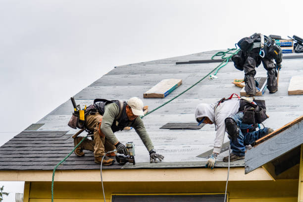 Professional Gutter Installation technician working in Hillsborough, CA